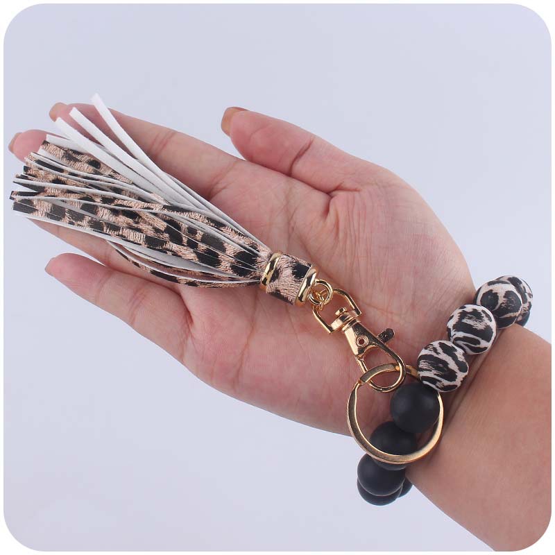 Creativo nuevo cuero pu borla colgante llavero silicona muñeca leopardo silicona pulsera llavero