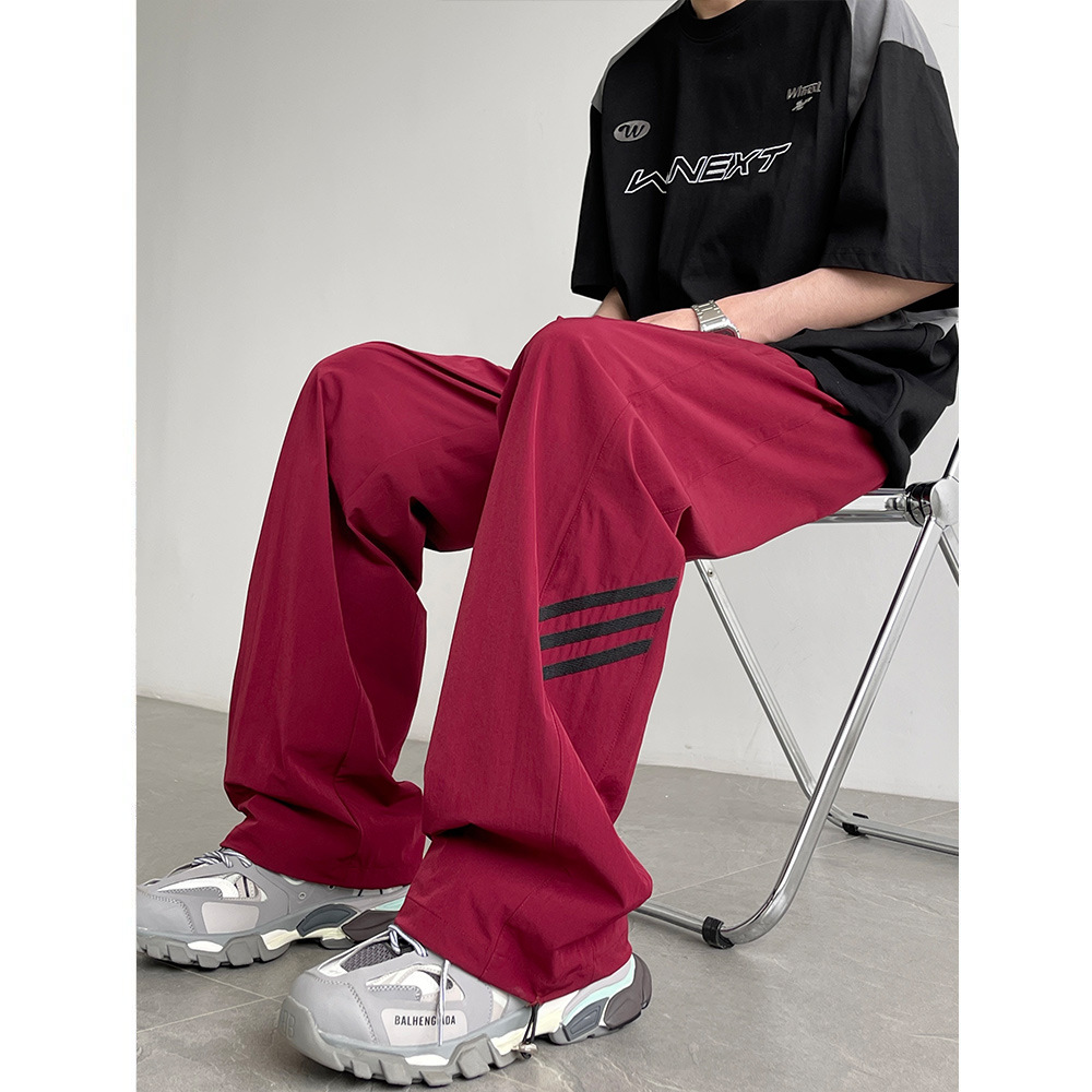 Pantalones de pierna ancha de secado rápido de calle alta estadounidense hombres y mujeres otoño nuevo casual suelto todo partido hip hop Rush pantalones moda masculina