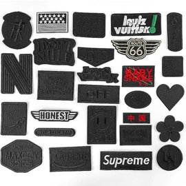 布贴;洗唛、商标;人造革