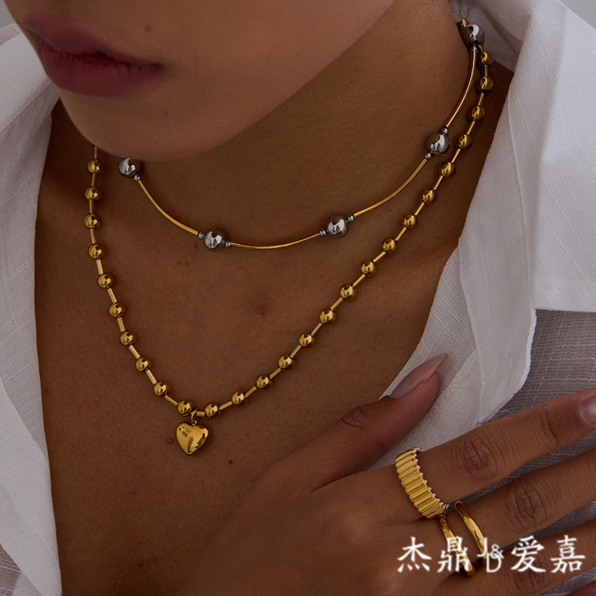 Jie Ding Collar de amor de acero inoxidable europeo y americano Pendientes simples de alta gama No se desvanece Joyas de acero de titanio Joyas transfronterizas Mujeres