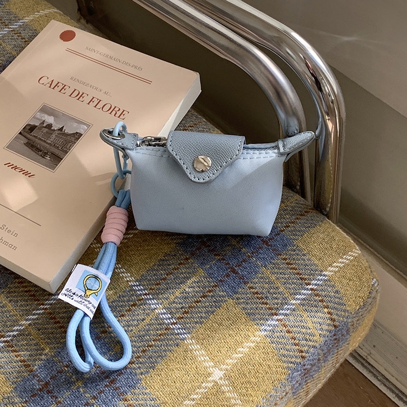 Moda coreana de almacenamiento bolsillos de cambio nuevo bolso portátil auricular bolso lindo mini 2026 bolso de lápiz labial para mujeres