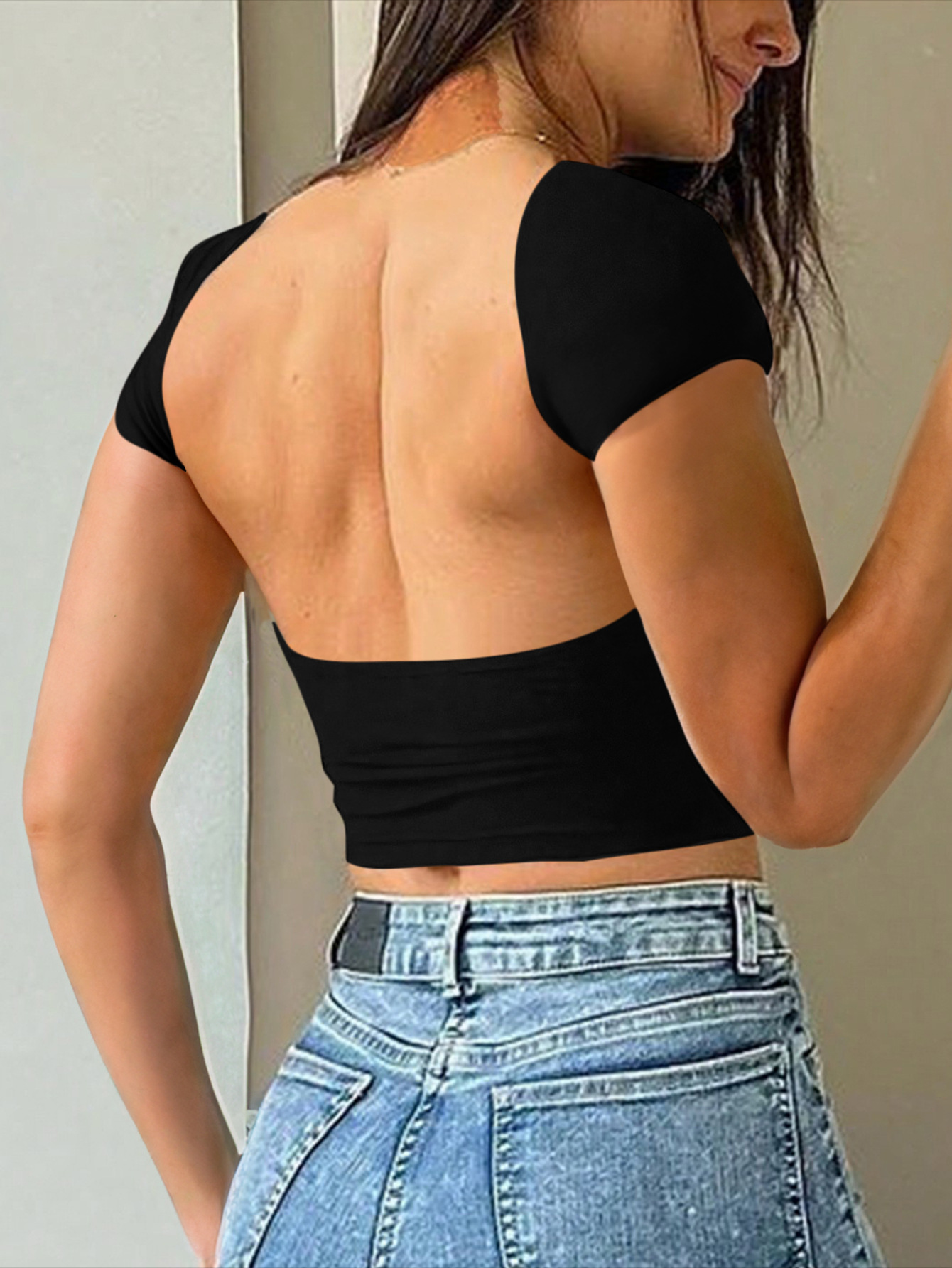 91g Weight Short Sleeve Sleeve Length Pullovers Placket Type Regular Sleeve Sleeve Type Spandex, Viscose fiber Fabric Type Regular Top Length T-shirt Tops Type Daily Occasion Round Neck Neckline Comfort Function Slim Fit Type Solid Color Pattern 2025 Spring and Summer Season Women's Gender Backless Design Streetwear Style Wholesale Women's Streetwear Solid Color Short Sleeve Backless T-Shirts 22