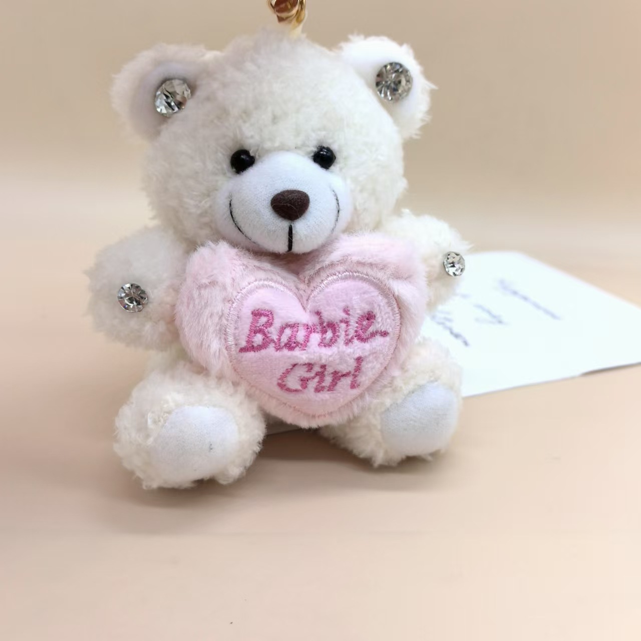 Versión coreana de Dongdaemun con la misma letra de amor dibujos animados oso de peluche muñeco de peluche bolso de muñeca colgante al por mayor