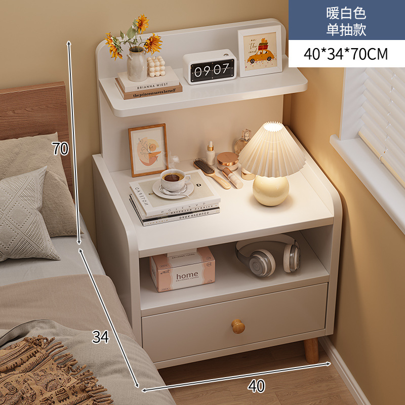 Mesilla de noche simple y moderno armario de almacenamiento de pierna de madera maciza pequeño dormitorio simple hogar 2025 nuevo estante de cabecera