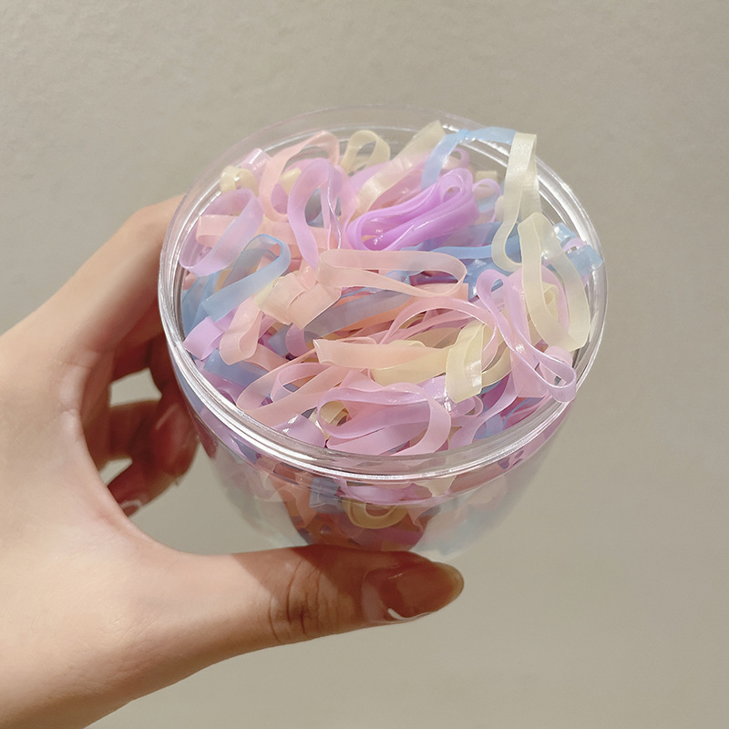 Las bandas de goma desechables de color para niños no dañan el cabello, alta elasticidad y durabilidad