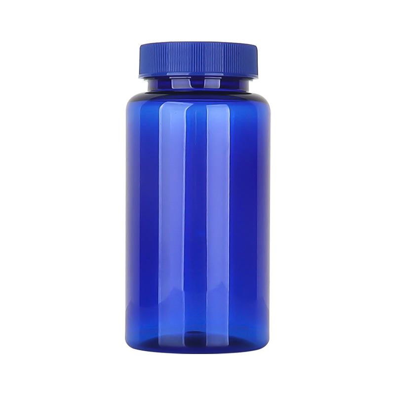 Botella de plástico azul 80–150 ml con tapa estriada, envase para suplementos o cápsulas.