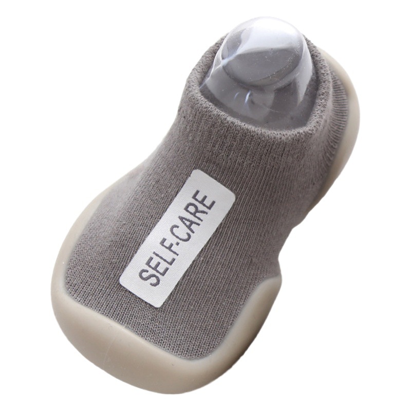 Primavera, verano y otoño calcetines de piso livianos para niños zapatos de bebé niño suela de goma tela de algodón impermeable zapatos y calcetines de educación temprana cortos estándar