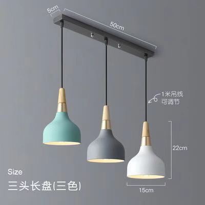 Candelabro de una sola cabeza Zhongshan, sensación avanzada, mesa de comedor de estilo cremoso creativo nórdico, lámpara de mesita de noche, araña de arte minimalista moderno