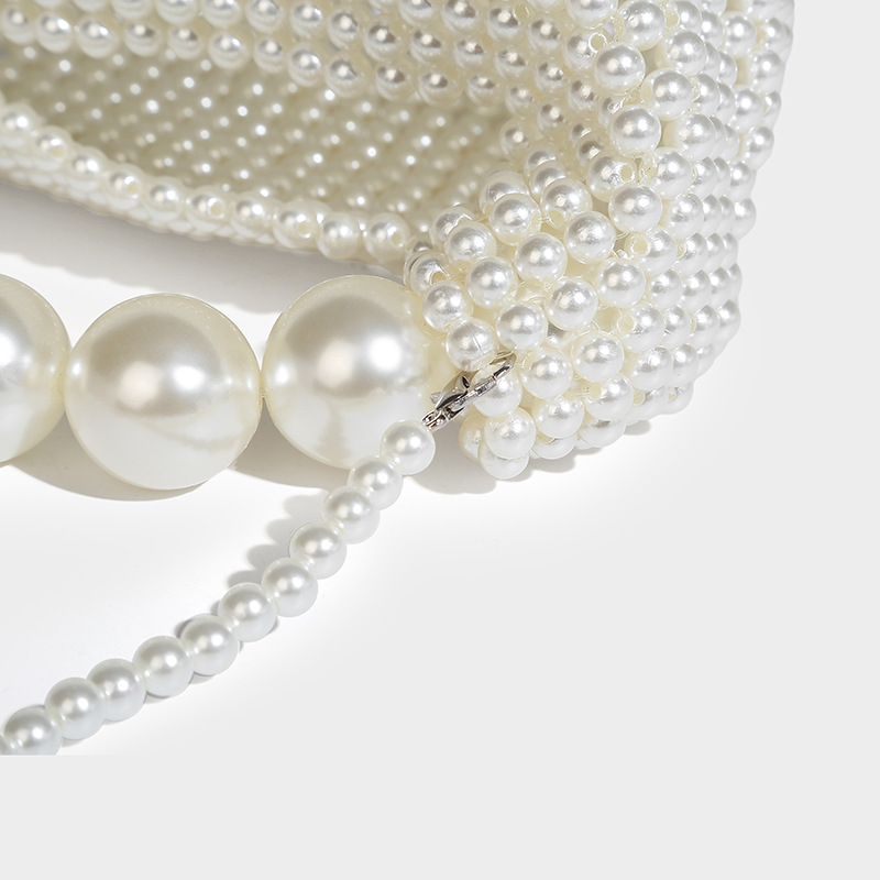 Perlina in stile francese Ins con design cavo, dolce ragazza versatile perla tenuta in mano, croce diagonale a spalla singola intrecciata a mano_voghion.com