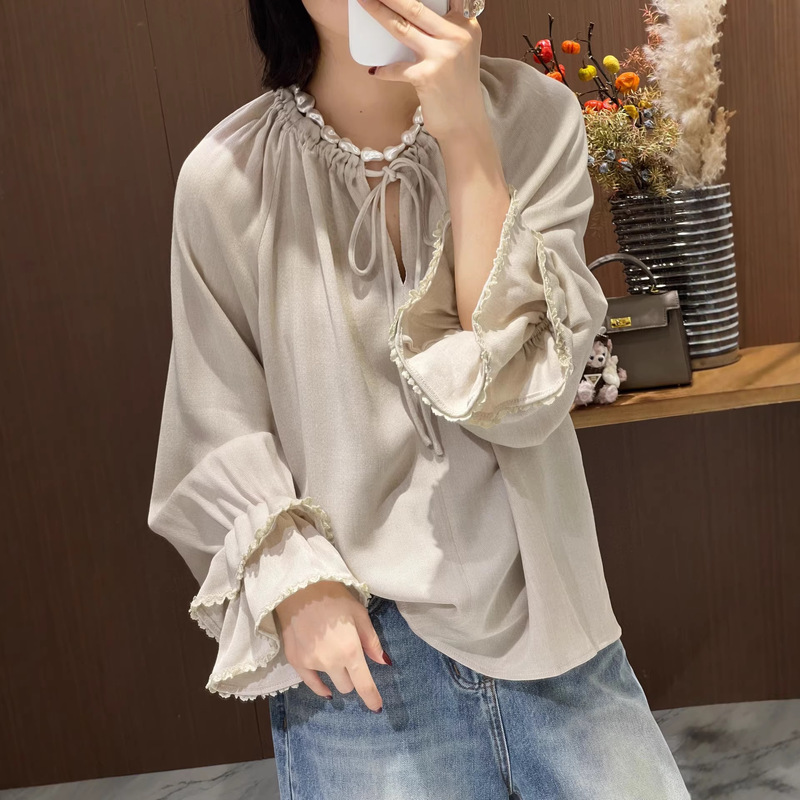 Imported Wool Tencel Double-Layer Ruffle Sleeves Lace-Trimmed Round Neck Pleated Tie-Neck Loose French-Style Shirt Spring 22 Imported Wool Tencel Double-Layer Ruffle Sleeves Lace-Trimmed Round Neck Pleated Tie-Neck Loose French-Style Shirt Spring 22