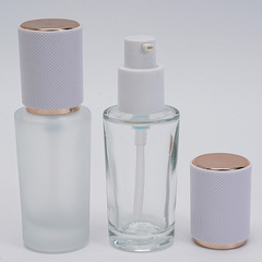 現物30ml透明つや消し厚い底の円柱の瓶の粉の底の液体の瓶の乳液はポンプの頭を押して瓶を分けて卸売りします。