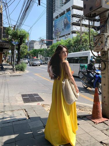 Beach vacation sexy backless suspender dress for women's summer new loose a-line dress gentle yellow long dress