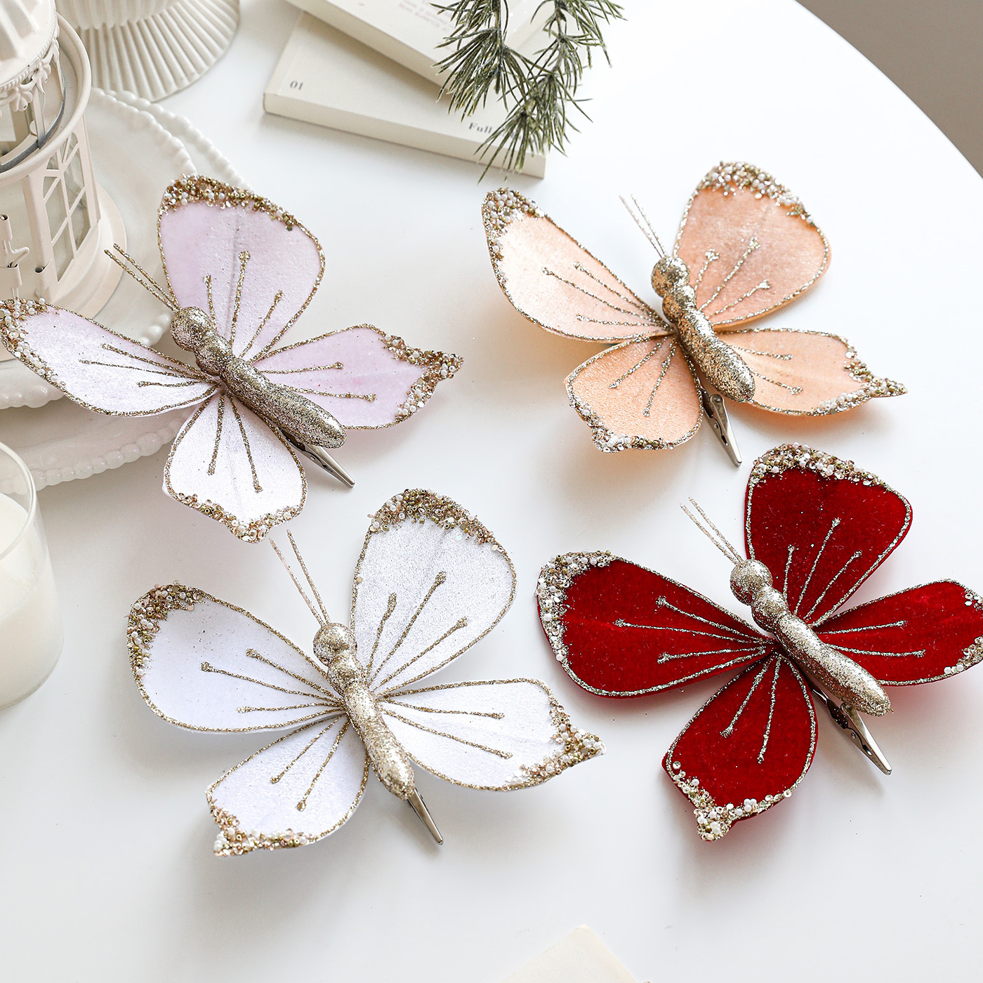 Nuevos productos de tela de alta calidad simulación de clip de arco de mariposa tela de vello polvo flocado árbol de Navidad decoración colgante diseño de escena