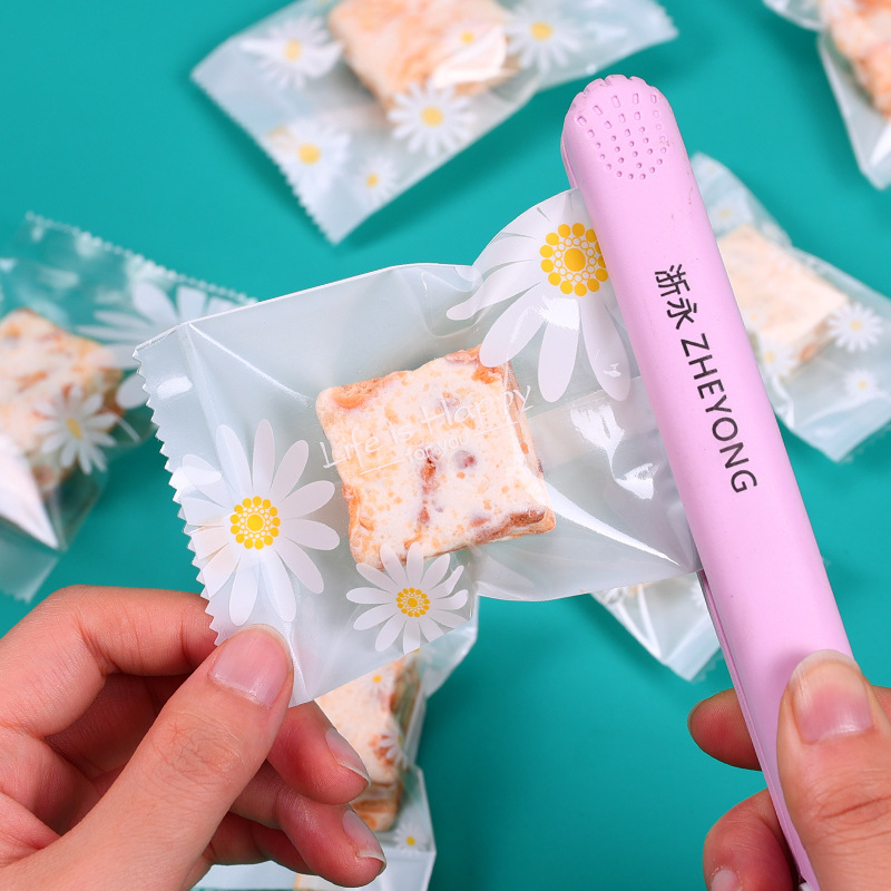 Original fondo blanco transparente Margarita turrón copo de nieve bolsa de embalaje crujiente galleta helado pastel de Luna yema de huevo crujiente máquina sello bolsa