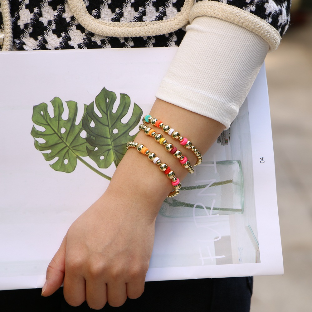 simple design sense elastic soft ceramic gilded copper bead bracelet