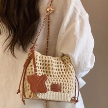 夏季镂空甜美腋下包包时尚通勤斜挎包高质感沙滩乌托邦小镇水桶包