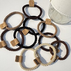 高弾性ベーシックベアラベルヘアロープツイストゴムバンドヘアアクセサリーハイポニーテールレザーケース多用途帽子卸売