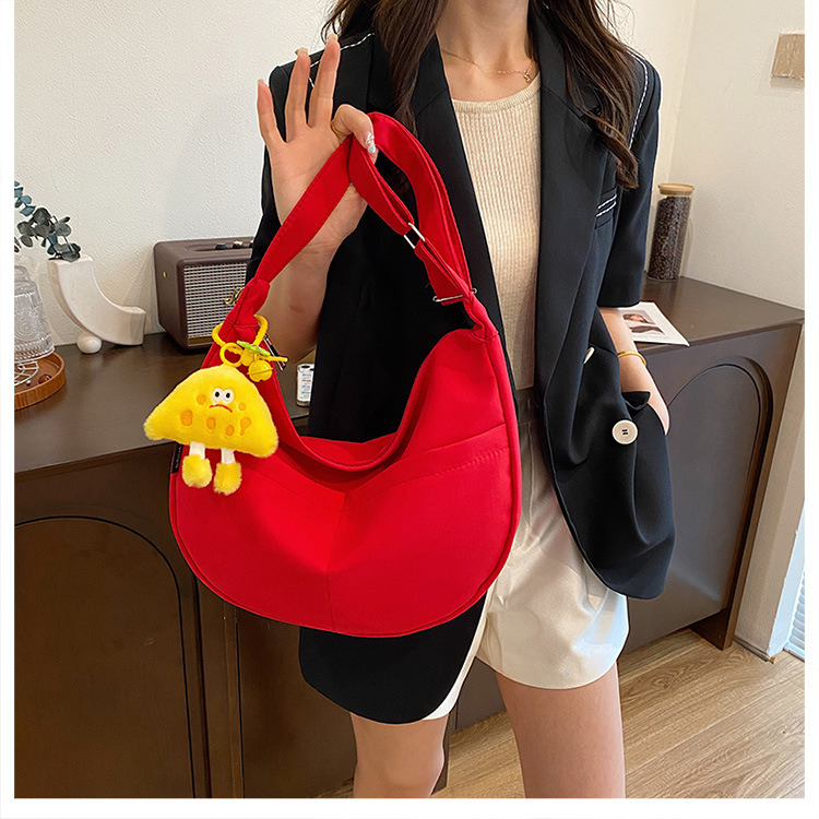 Simple solid-color canvas bag 2024 new style Japanese large-capacity single-shoulder dumpling bag, versatile for school and commuting crossbody bag undefined