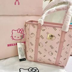 ハローキティのケイティのバケツのカバンはクラシックなプリントの質感のボストンバッグの大容量の女性の小さい衆を合わせます。