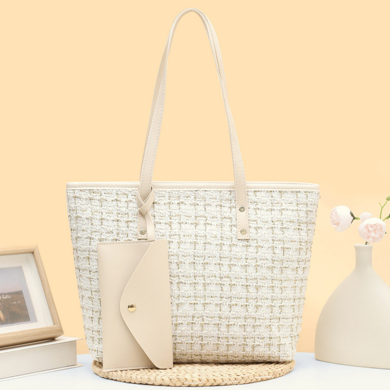 2025 nuevo bolso de cubo de tela de tela de mano de mujer alta calidad bolso de hombro de moda temperamento universal nicho bolso de mochila