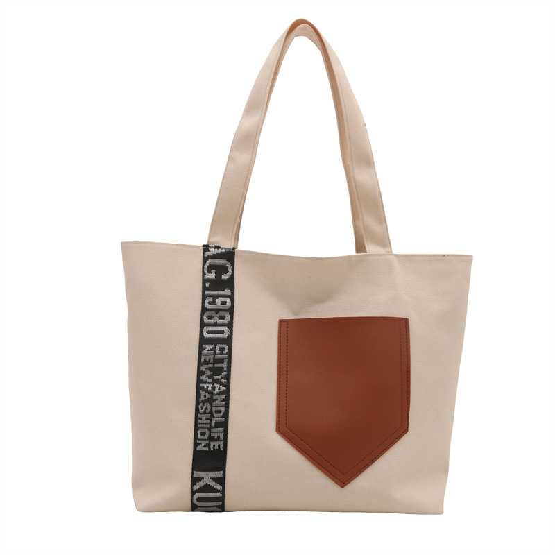 Bolso de mujer 2024 invierno nuevo bolso de gran capacidad de transporte de lona bolso de brazo de moda simple bolso de hombro