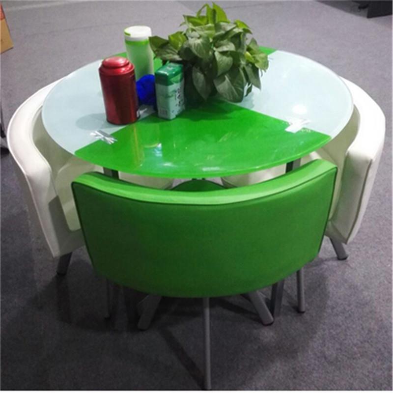 Mesa y sillas de comedor modernas, mesa redonda pequeña de vidrio templado, mesa y sillas para recepción y negociación, una mesa y cuatro sillas, cocina de inducción.