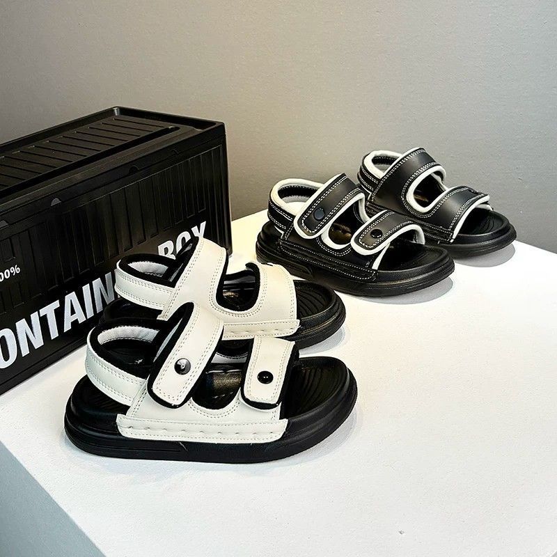 Sandalias de dedos abiertos huecos para niños 2026 verano nuevo tipo de zapatos de bebé antideslizantes con suela suave zapatos de playa casuales para niños mayores image 1