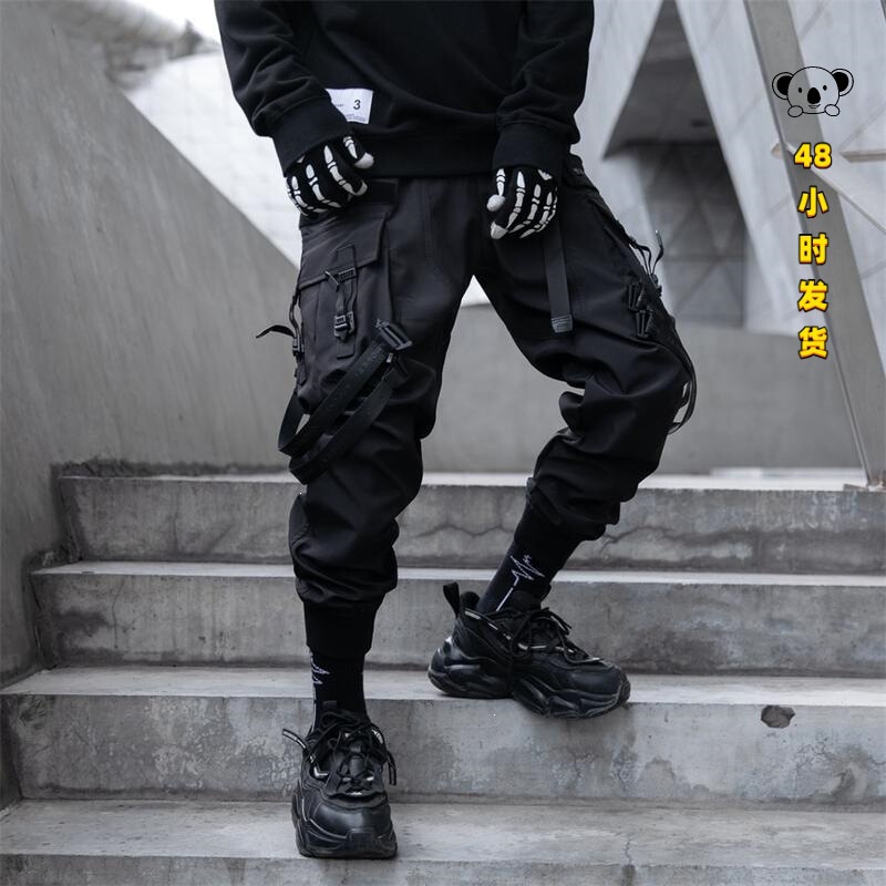 Cross-border functional tactical work pants for men, featuring multiple pockets, drawstrings, and a street-style, cool, paratrooper-inspired design, suitable for outdoor and casual wear Cross-border functional tactical work pants for men, featuring multiple pockets, drawstrings, and a street-style, cool, paratrooper-inspired design, suitable for outdoor and casual wear