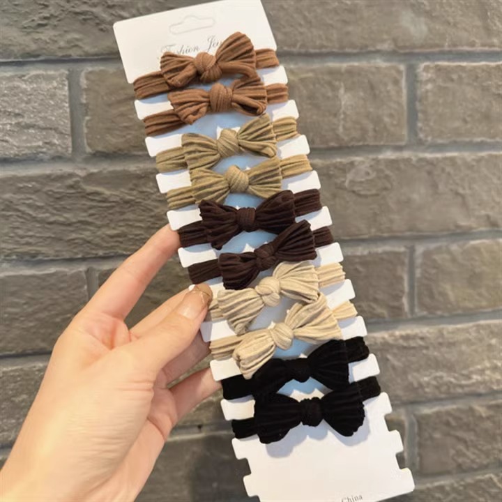 Einfacher Stil Einfarbig Bogenknoten Tuch Schleife Haargummi display picture 9