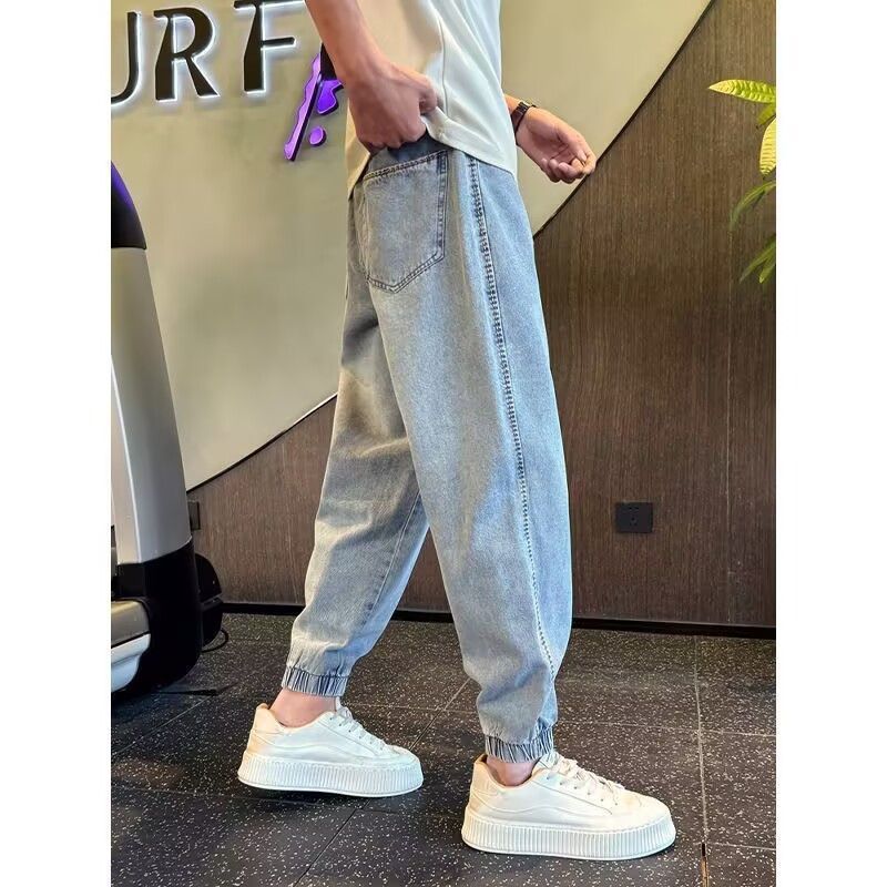 Jean de jogging à taille élastique pour homme, coupe ample et tendance, style harem, idéal pour le printemps et l'automne. Pantalon fuselé polyvalent et décontracté._voghion.com
