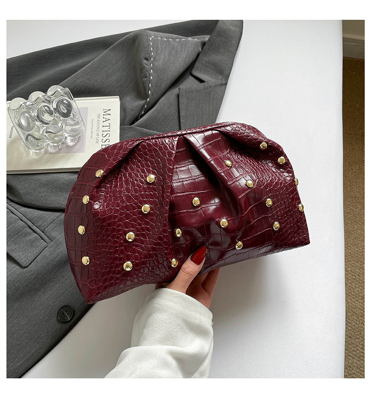2026 tendencia de primavera nuevo clip de textura simple clavos de hongo de moda de textura plegada bolso de mano mujer