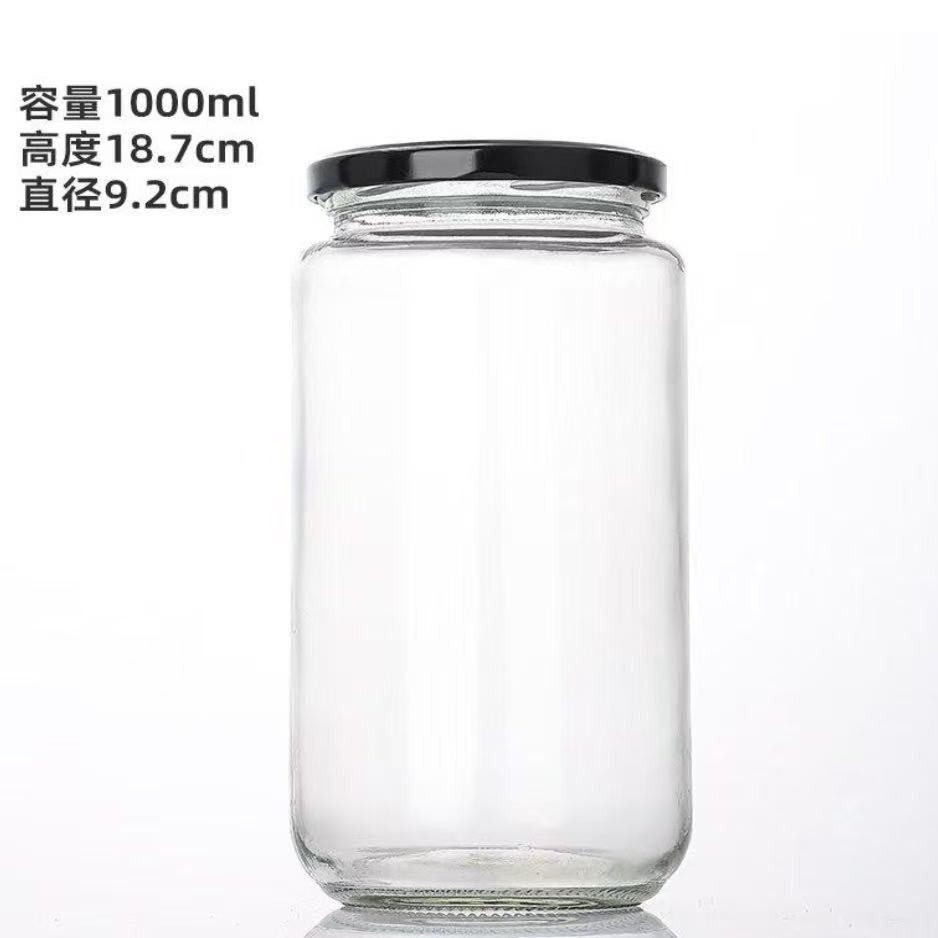 Botella de vidrio al por mayor botella vacía de grado alimenticio hervir botella de conservación de miel mermelada botella de hongos shiitake