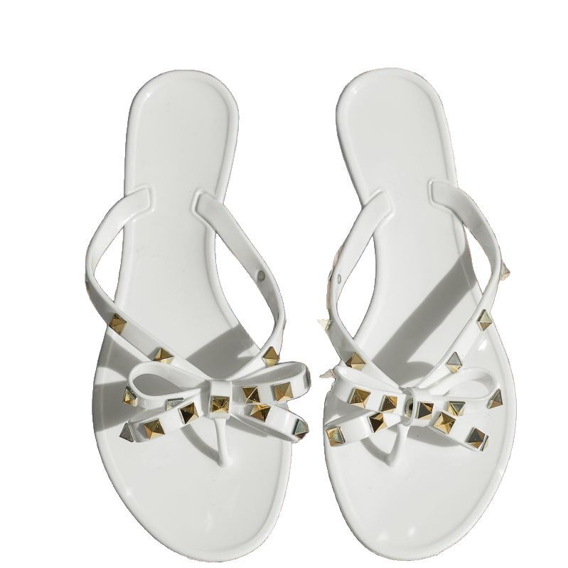 Infradito donna estive con fiocco e borchie per spiaggia e mare_voghion.com