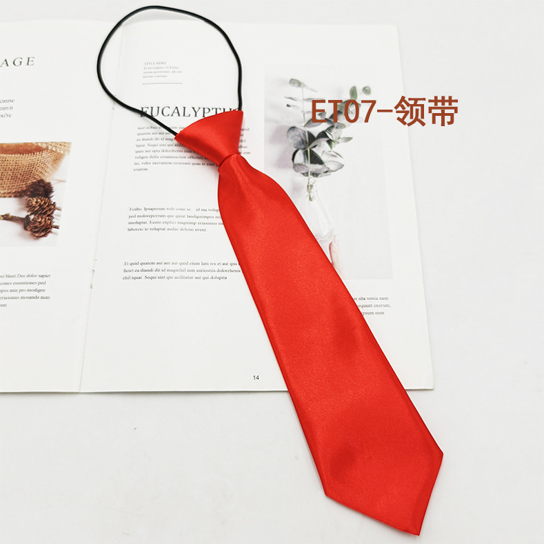 Spot de fábrica al por mayor conjunto de pajarita de corbata para niños de escuela primaria, corbata a rayas de color sólido, pajarita de raíz de plumas