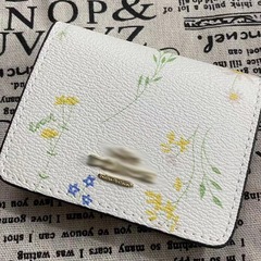 C家coaチェーンの小銭入れは女性の短い金を挟んで外国貿易のクロスボーダーの商品を購入します。