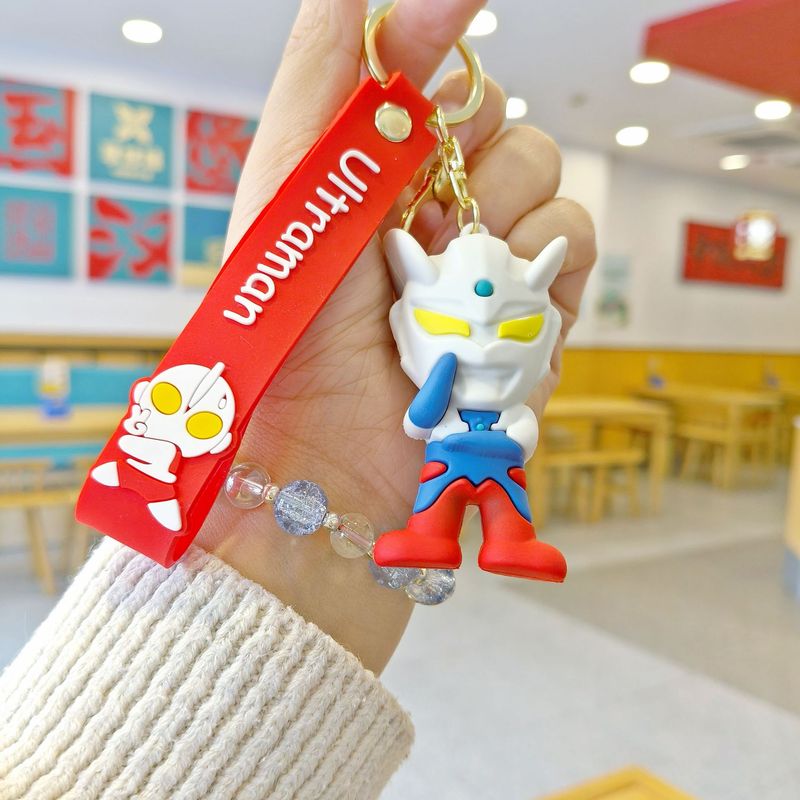創意的なアニメのウルトラマンのキーホルダーは学生のカバンの自動車のキーチェーンのブラインドの箱の子供機の贈り物を掛けます。|undefined
