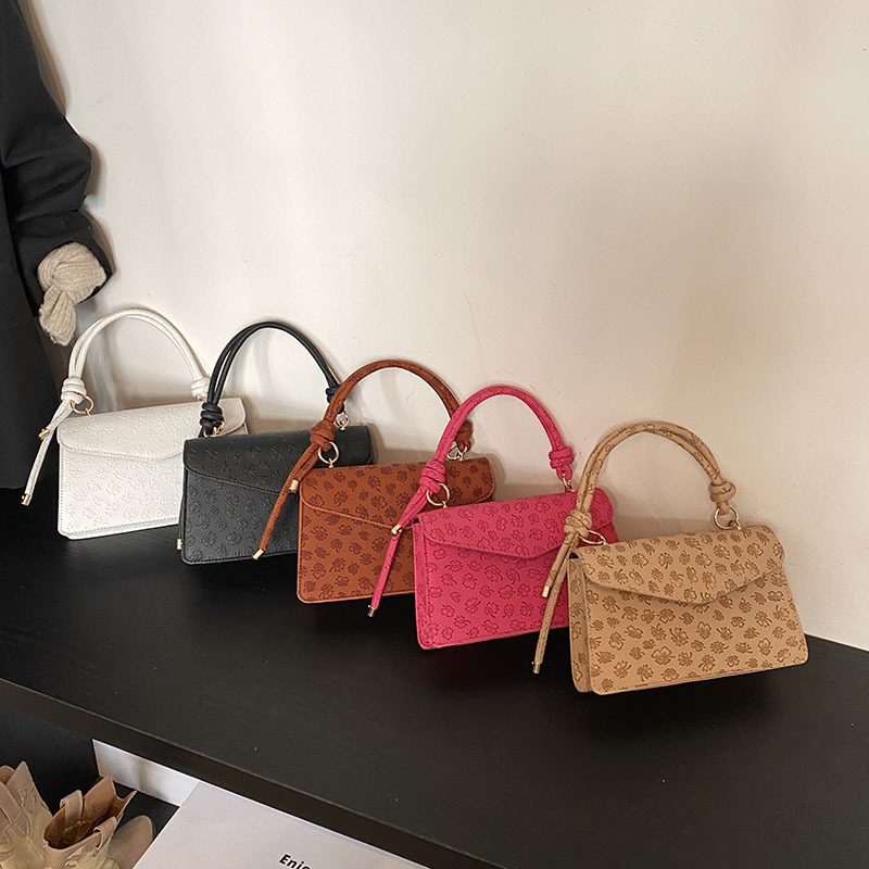 Simple retro tendencia extranjera bolso de mujer 2025 primavera nuevo temperamento casual de hombro mochila pequeña bolsa de mujer