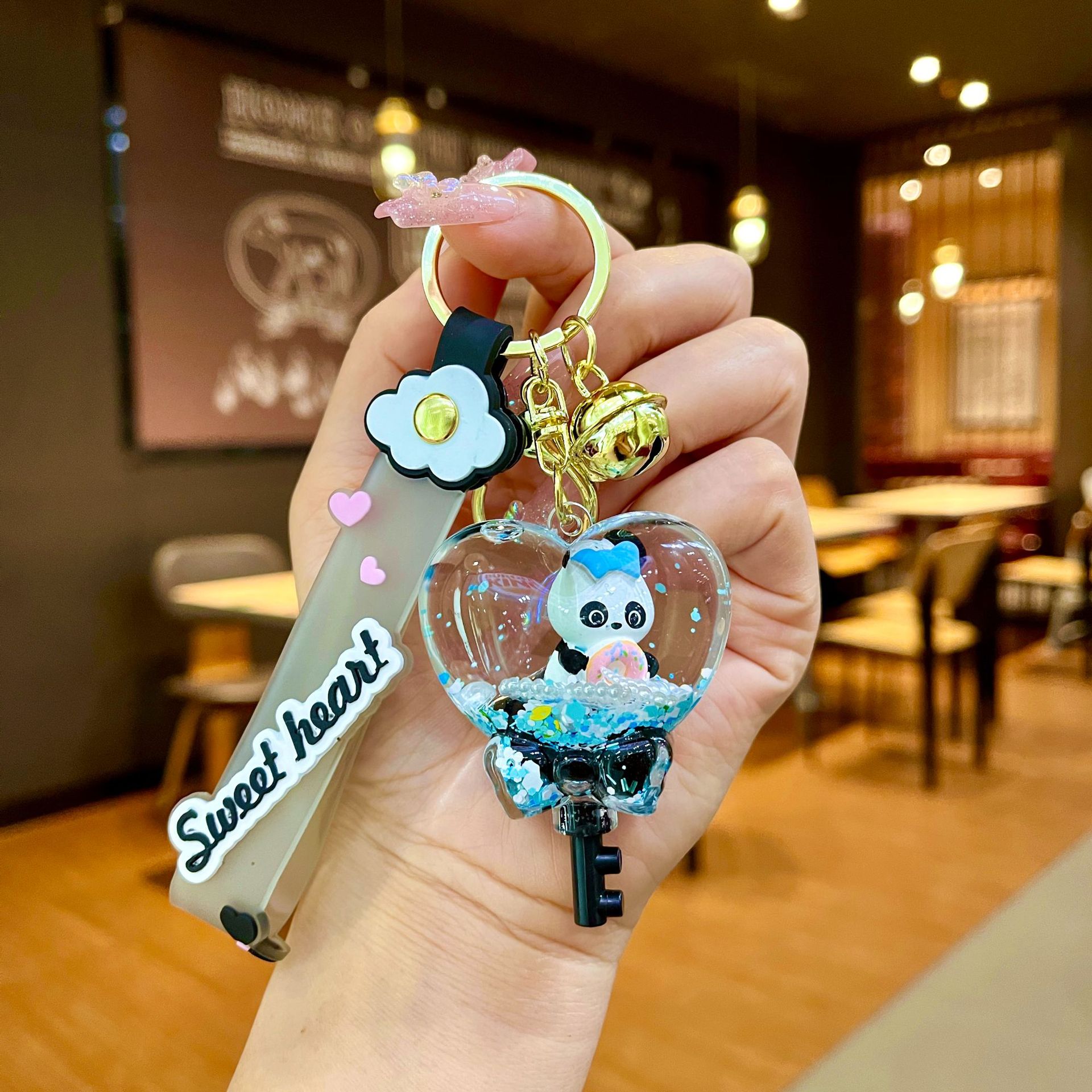 Nuevo llavero de dados luminosos con aceite, cuentas de burbujas, dados, colgantes de botella de arena de cristal, colgantes de bolsas al por mayor