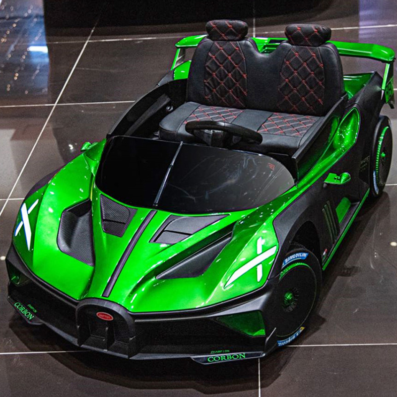 Coche eléctrico para niños coche de control remoto sentado bebé coche deportivo de cuatro ruedas entrega de una pieza coche de juguete recargable