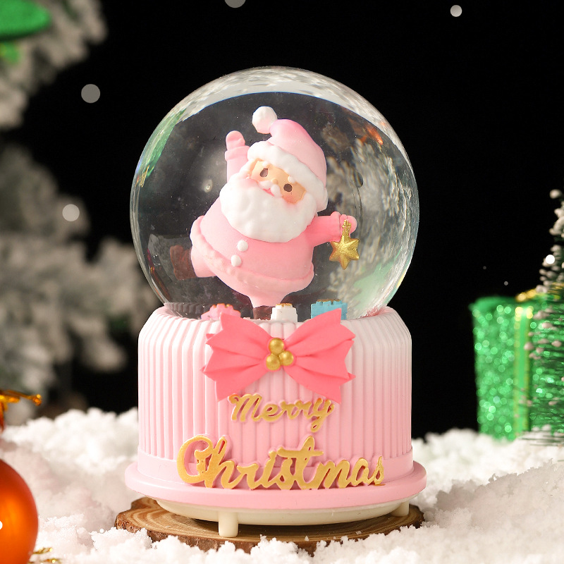 Una variedad de regalos de decoración de Navidad Navidad iluminante bola de cristal caja de música ventana diseño de velas lámparas de viento árbol de Navidad