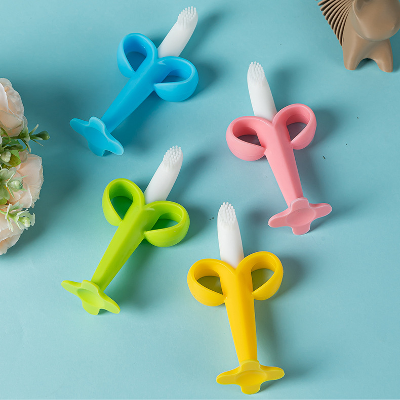 Silicone de grado alimenticio estereoscópico banano diente de goma de diente para bebés dientes de leche de goma de goma de pulsera banano cepillo de dientes