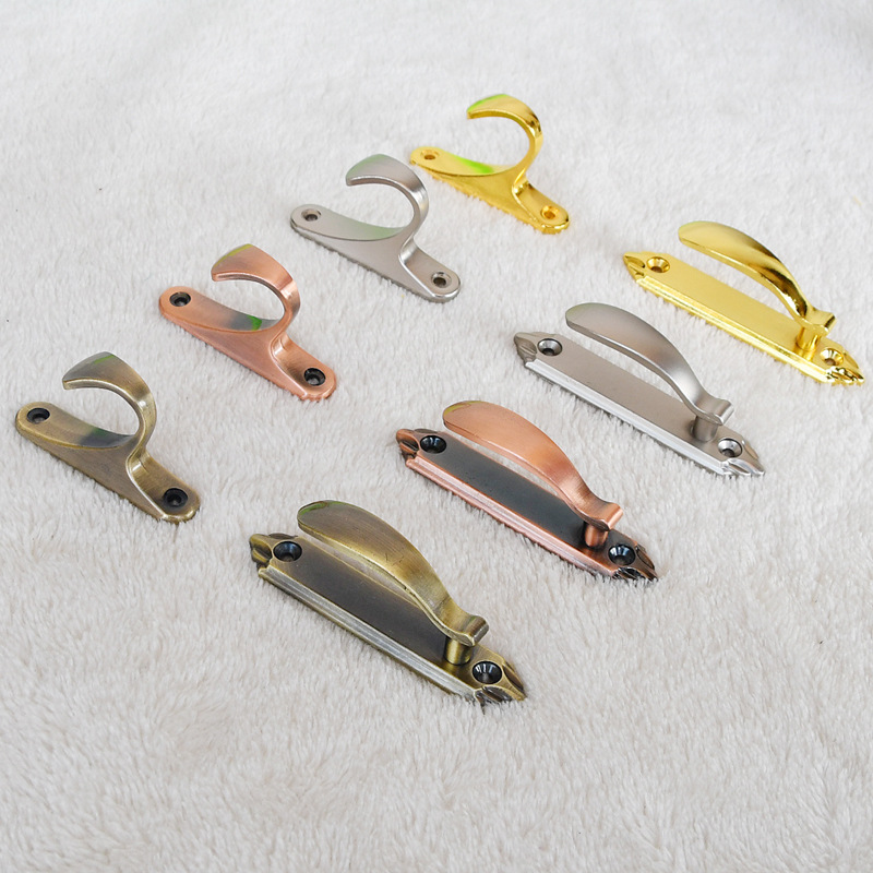 A zinc alloy manufacturer's hook, a new and innovative curtain wall hook with a ball, strap, and various accessories.