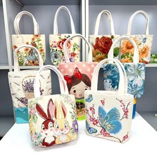 爆款帆布包手机零钱包卡通包双面提花手拎包刺绣图案可爱小包批发