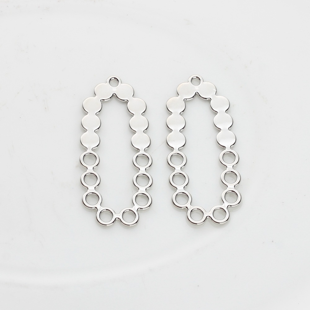 Aleación de estilo coreano irregular hueco oval punto forma colgante accesorios DIY joyería pendientes accesorios material