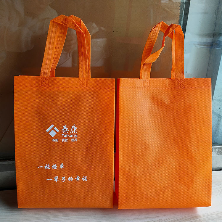 Factory wholesale longitudinal advertising tote bag Taikang gift packaging bag supermarket shopping bag non-woven bag information bag
