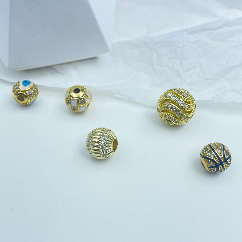 18k包みの金の保色の小さいはめ込みの透かし彫りのジルコンのボールのdiyのアクセサリの悪魔の目のブレスレットのビーズ|undefined
