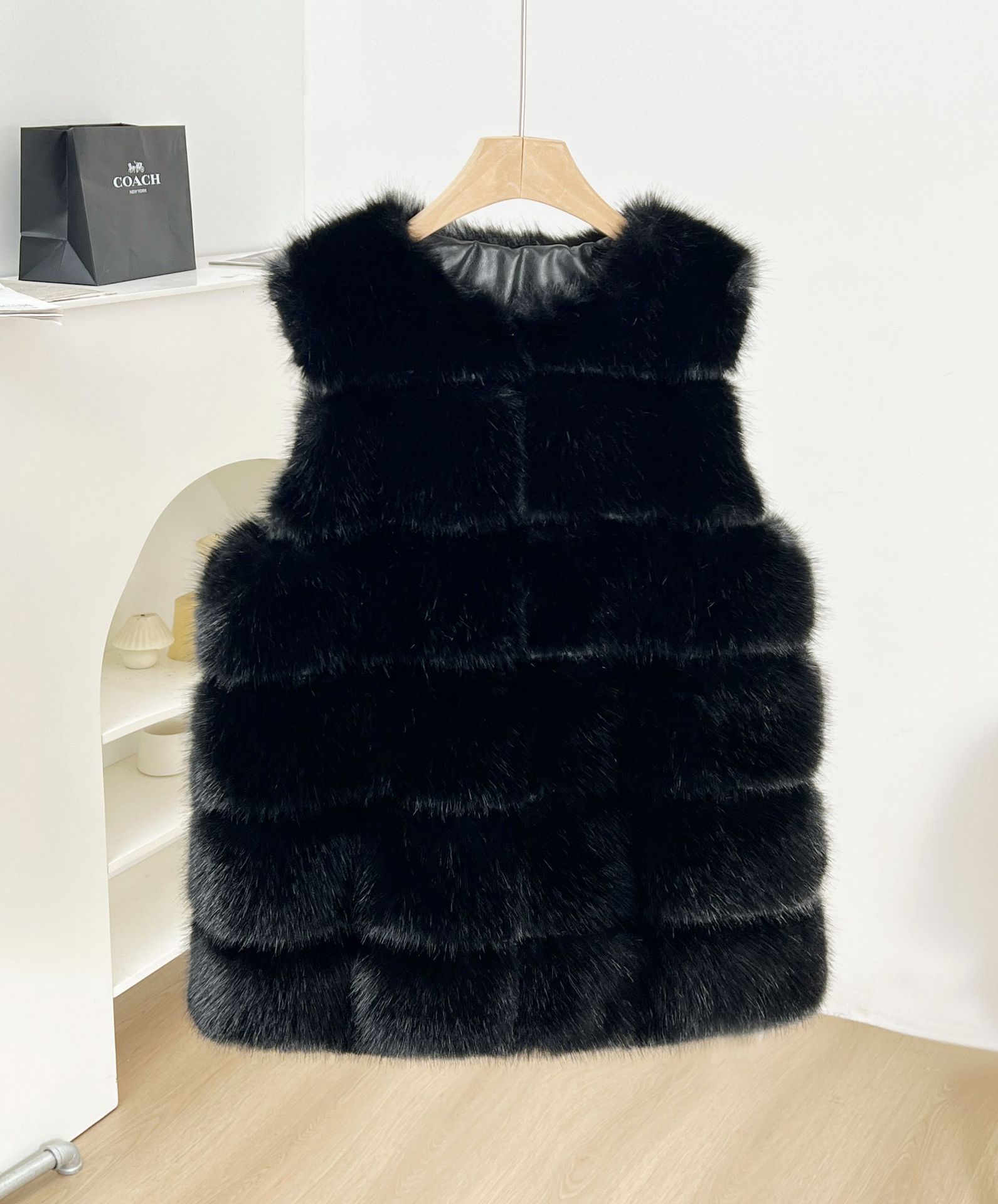 Clásico de seis puntas chaleco de conejo de pelo de zorro chaqueta larga al por mayor simple estilo exterior estilo