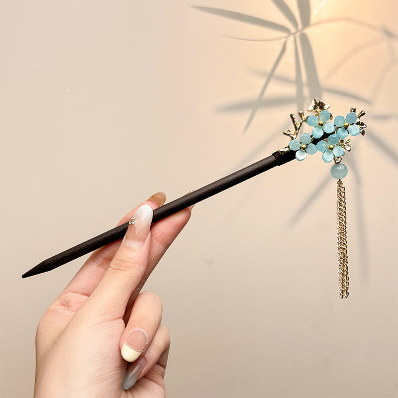 Nueva horquilla china 2025 nuevo estilo estilo antiguo horquilla mujer falda de cara de caballo de alta calidad estilo nacional horquilla de madera paso a paso horquilla tocado