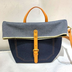 Factory direct vegetable tanned leather heavy red ear tannin denim bag Japanese niche diagonal bag men's and women's barrel bag