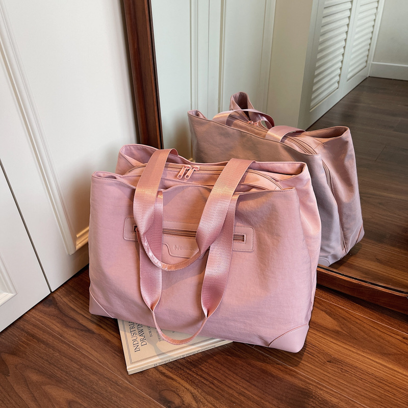 Nuevo tipo de tela casuales de mujer de hombro bolsa de viaje corto de gran capacidad de color sólido bolsa de equipaje ligero de mujer